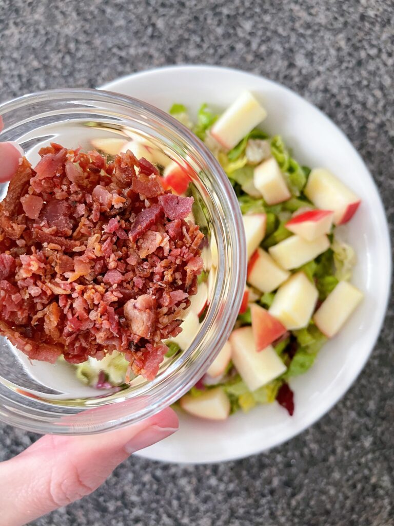 A bowl of bacon pieces.