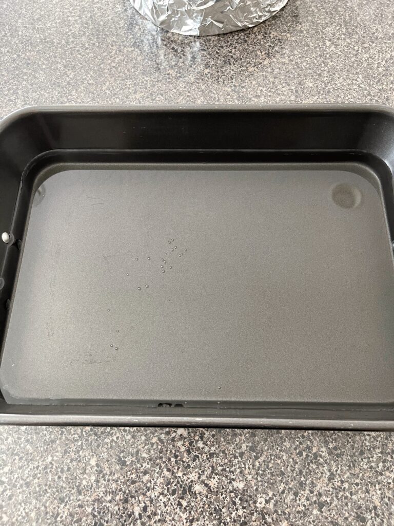 A roasting pan filled with water.