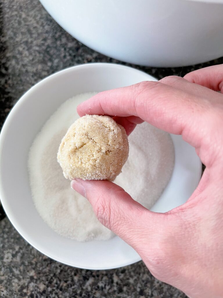 A ball of cookie dough rolled in sugar.