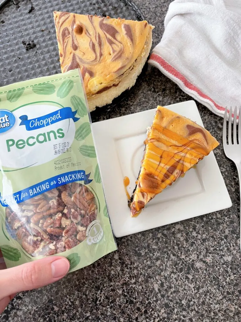 A package of chopped pecans and a slice of caramel pecan turtle cheesecake.