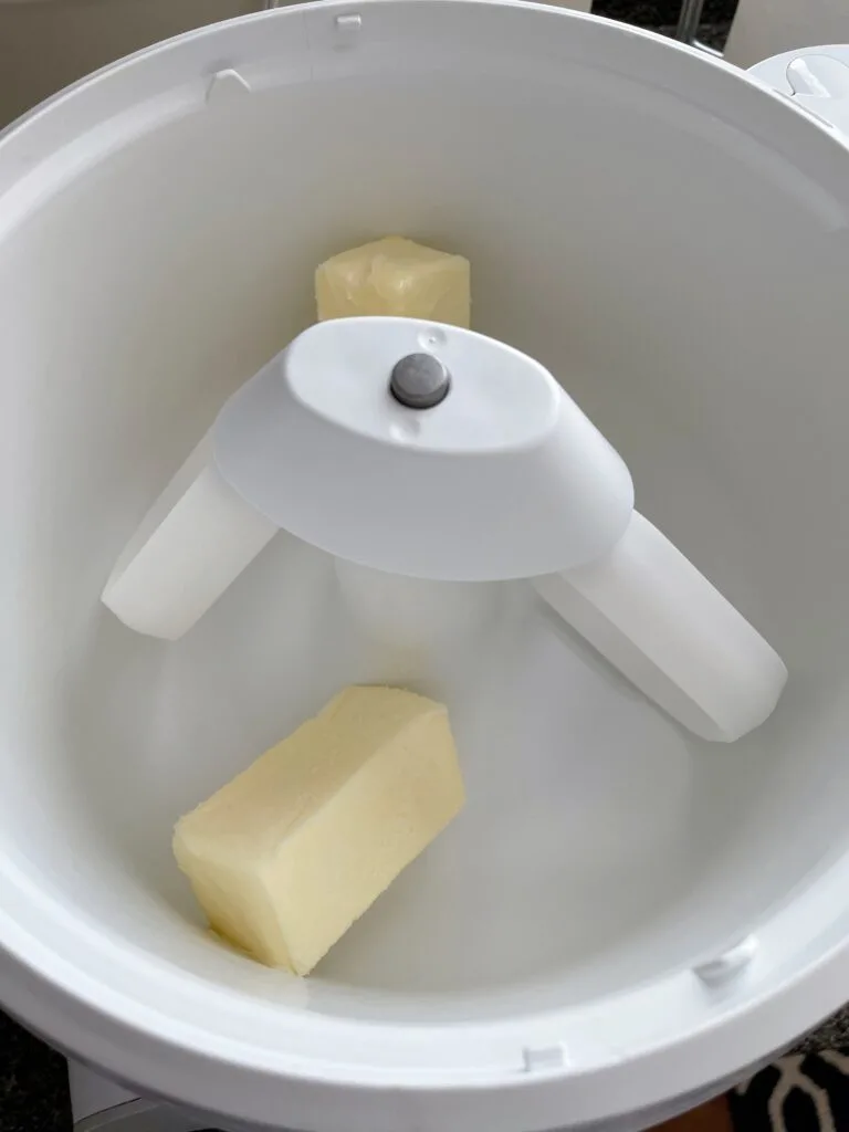 Butter in a stand mixer.