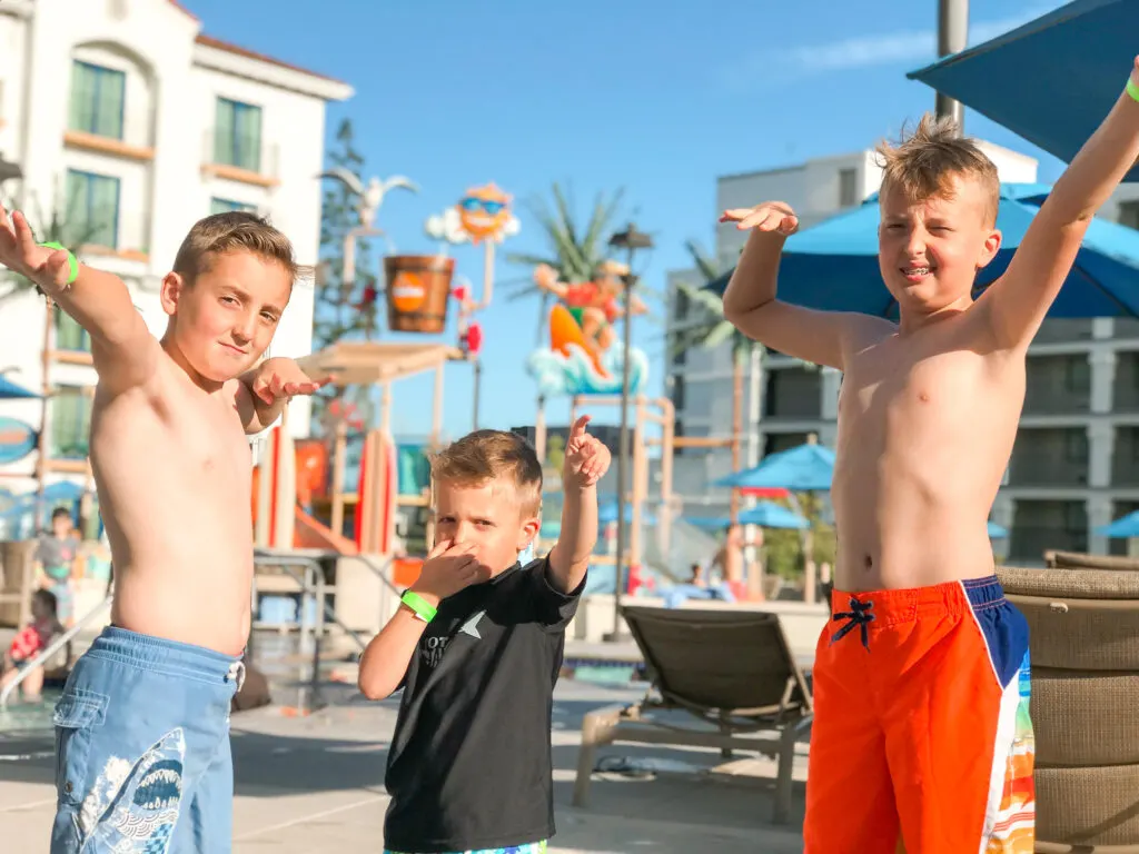 Three kids at Surfside Waterpark at Courtyard Anaheim Theme Park Entrance.