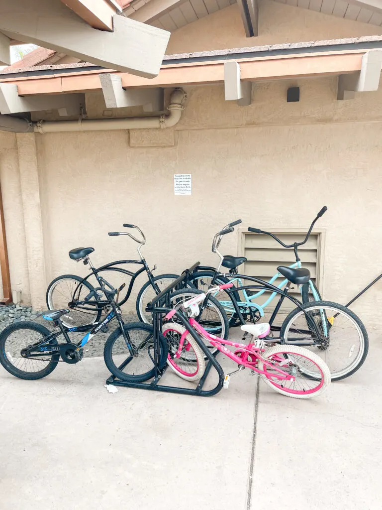 Bikes on a bike rack that are complimentary for guests of Best Western Island Palms.