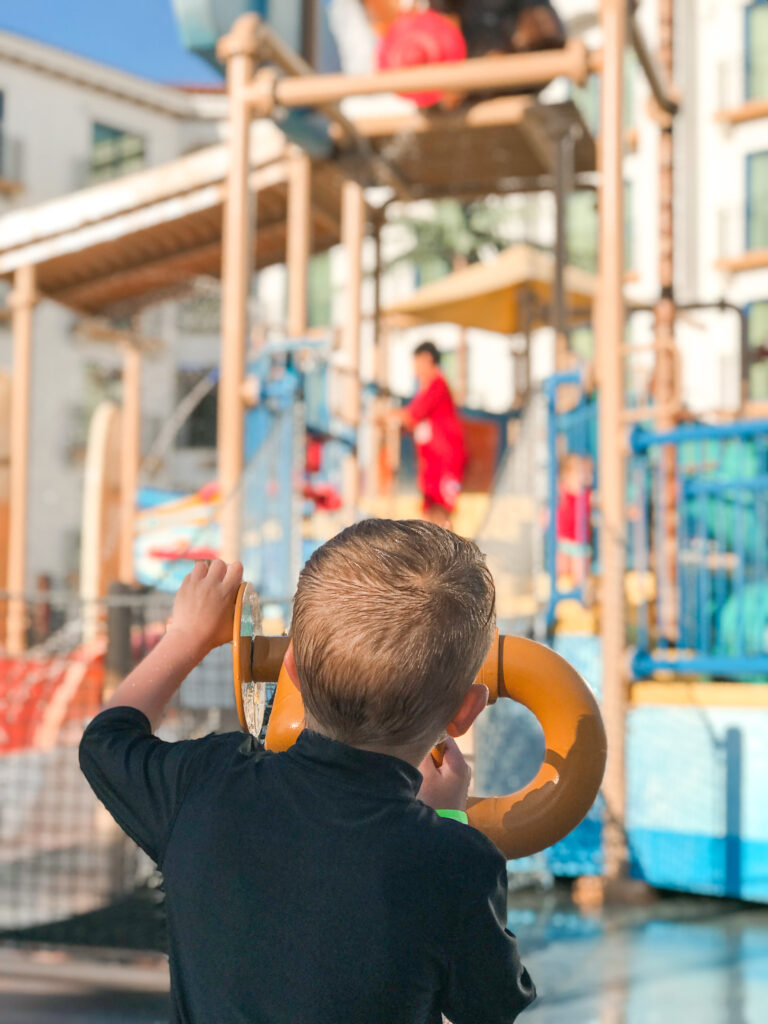 A boy playing at the waterpark at Courtyard Anaheim.