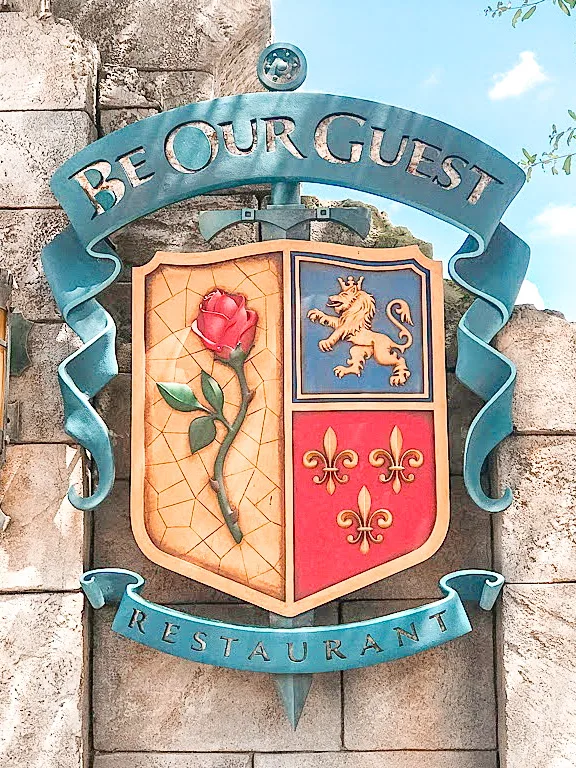 Sign for Be Our Guest restaurant at Disney World.
