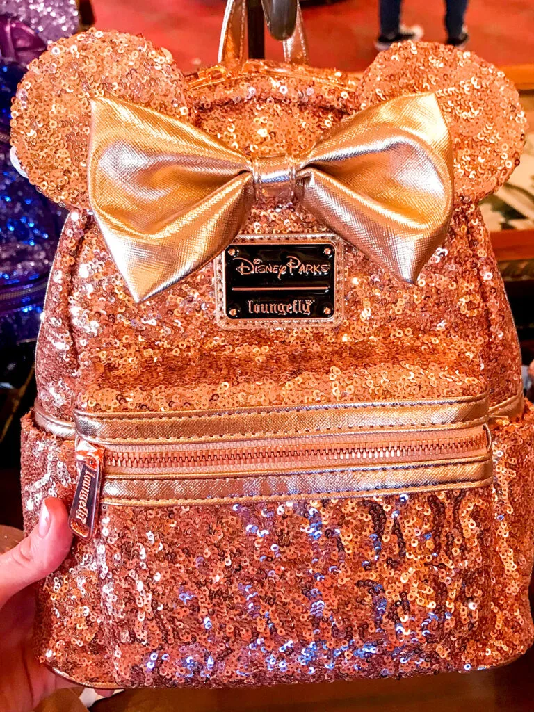 Rose Gold Minnie Mouse Loungefly backpack.