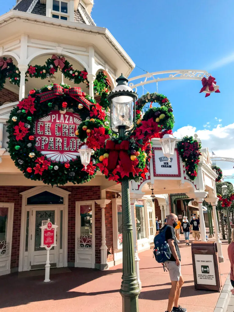 Main Street USA at Magic Kingdom decorated for Christmas.