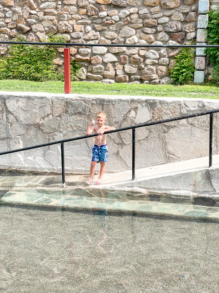 A boy in the hottest pool at Lava Hot Springs.