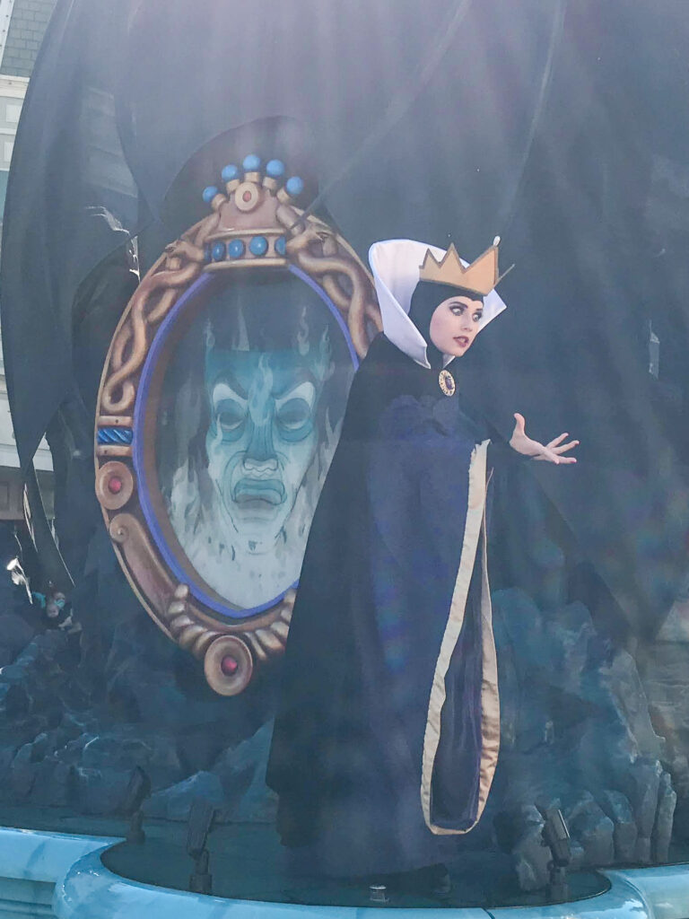 The Evil Queen from Snow White in a cavalcade at Magic Kingdom.