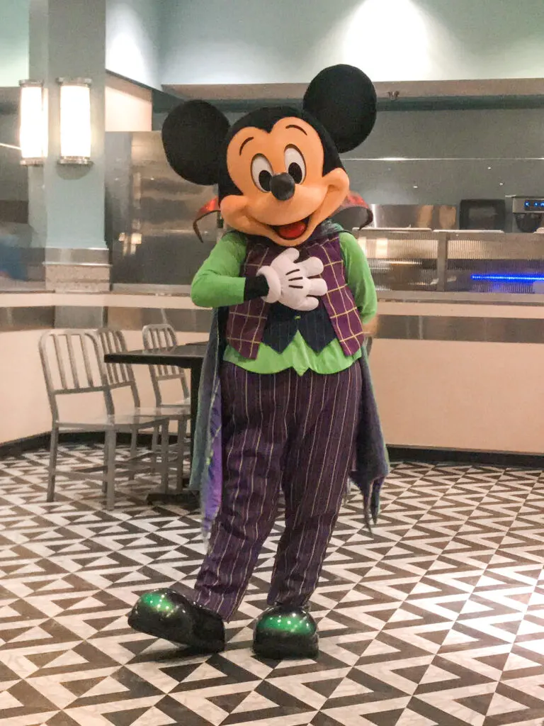 Mickey Mouse dressed as a vampire at Disney World.