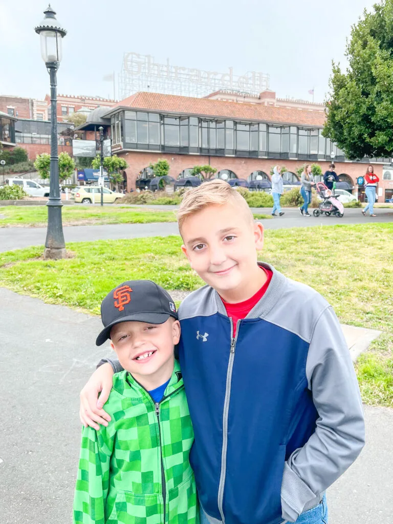 Two boys in front of Ghirardelli Square.
