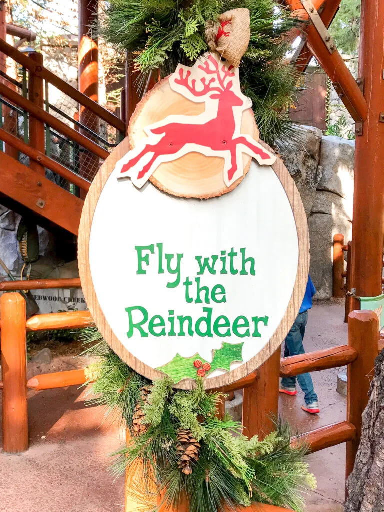 Fly with the Reindeer sign at Disney California Adventure Redwood Creek Challenge Trail.