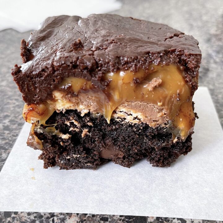 A brownie layered with Snickers bars, melted caramel, and chocolate ganache.