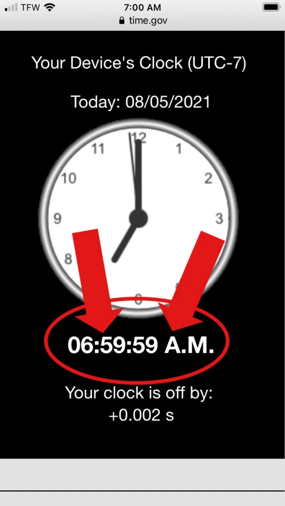 A clock showing 06:59:59 am.