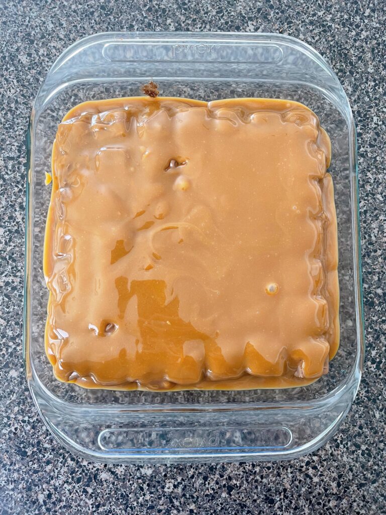 Melted caramel poured over Snickers candy bars and brownies.