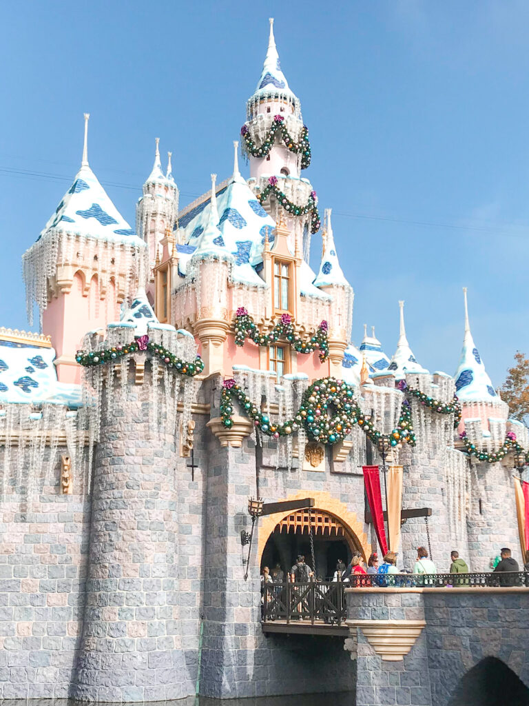 Sleeping Beauty Castle with holiday decorations.