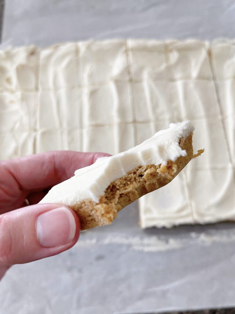 A close-up picture of a pumpkin sugar cookie bar.