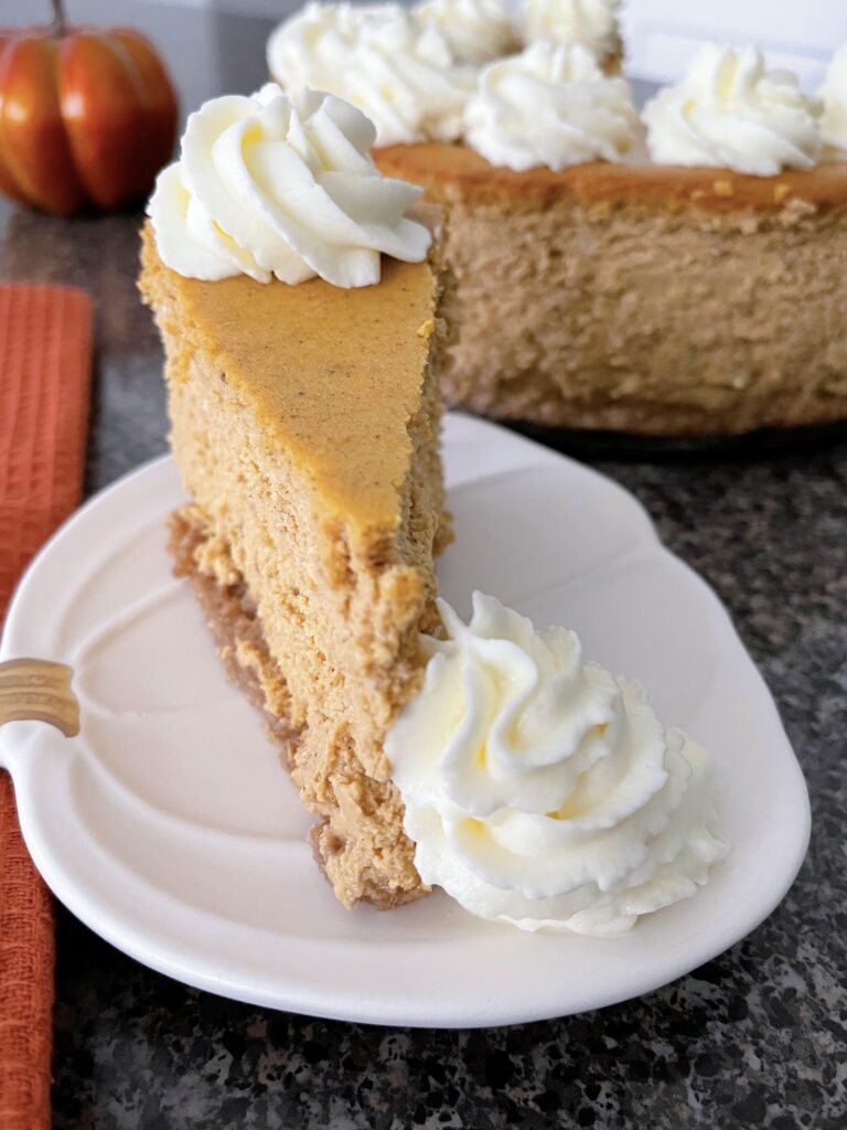 A slice of copycat Cheesecake Factory pumpkin cheesecake.