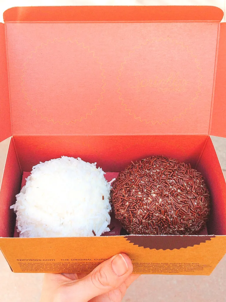 Two cupcakes from Sprinkles Cupcakes at Downtown Disney in California.