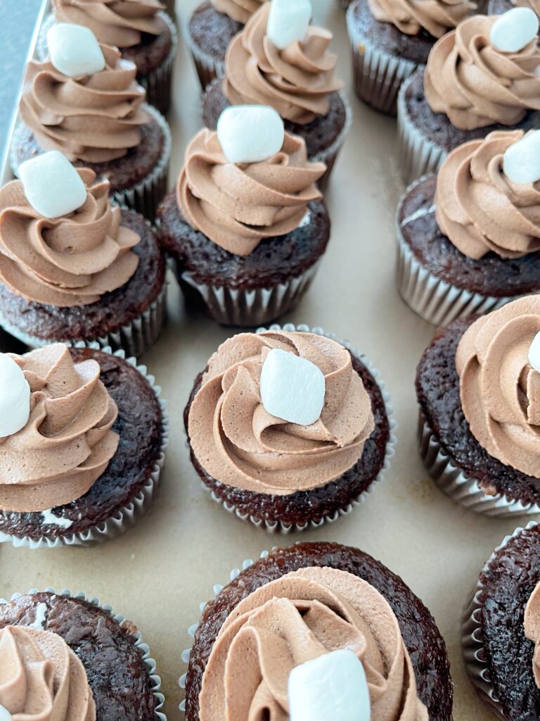A tray full of hot chocolate cupcakes.