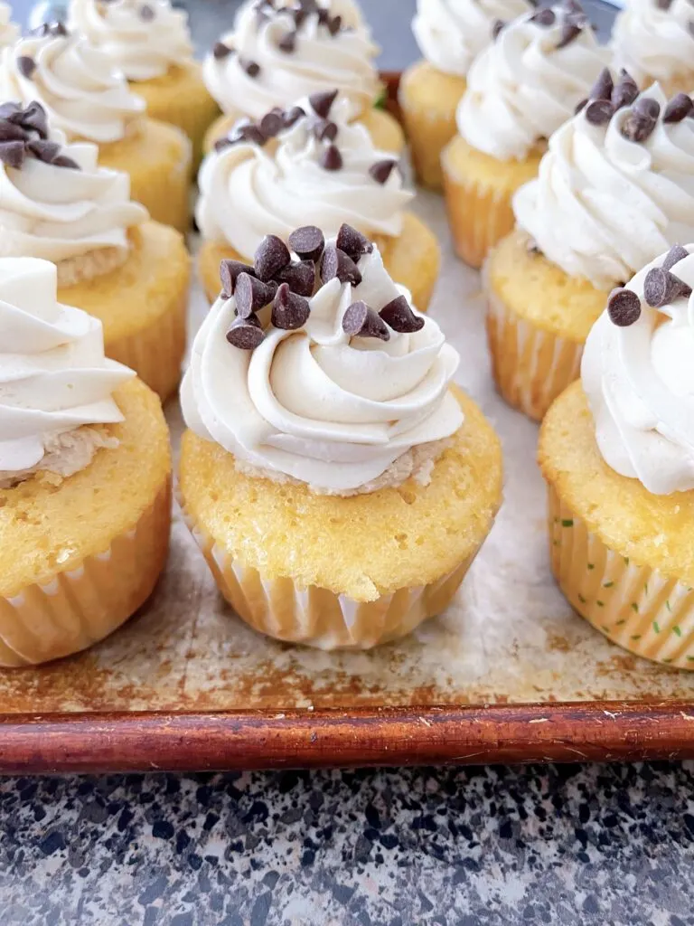 A pan of chocolate chip cookie dough cupcakes.