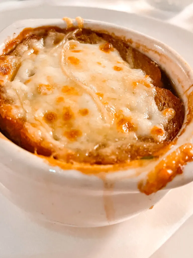 A bowl of French Onion Soup from Royal Palace on the Disney Dream.