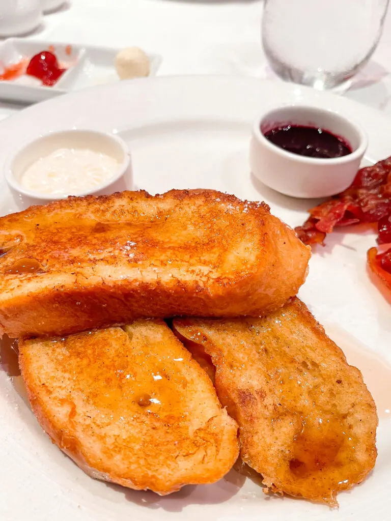 A plate of French toast on a Disney Cruise.