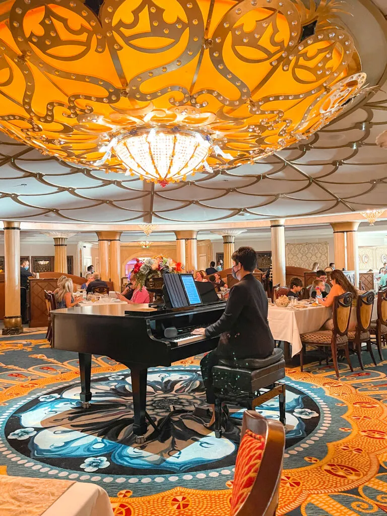 Pianist inside Royal Palace restaurant on the Disney Dream cruise ship.