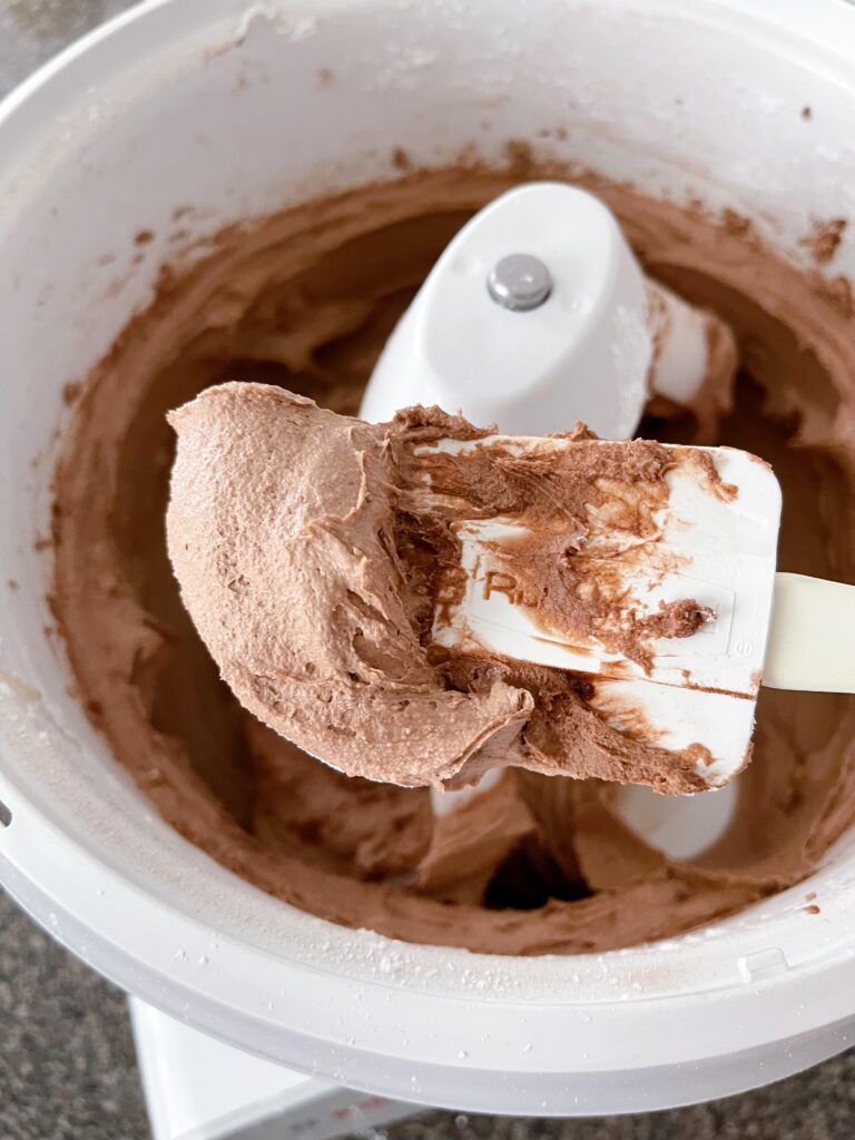 Hot chocolate frosting on a spatula.