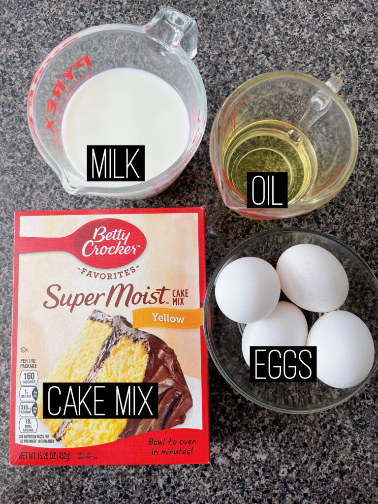 A picture of milk, cake mix, oil, and eggs. Ingredients to make cupcakes.