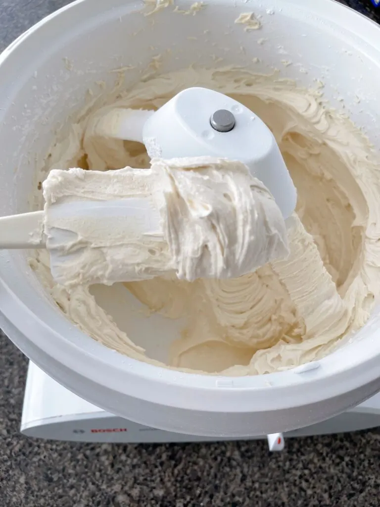 Brown sugar frosting on a  spatula.