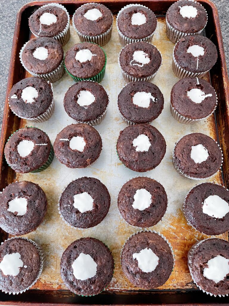 Chocolate cupcakes filled with marshmallow cream.