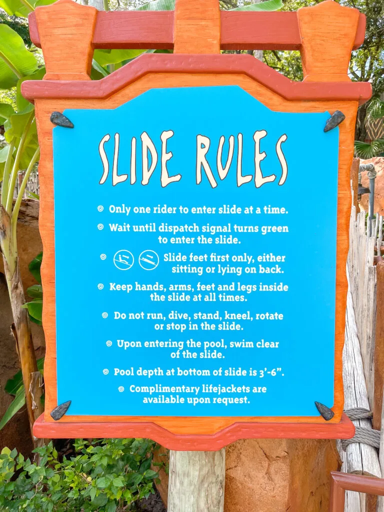 A sign showing water slide rules at Animal Kingdom Lodge.