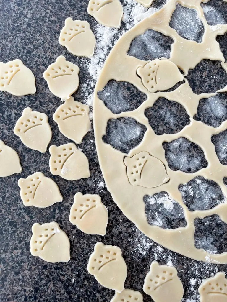Acorn shapes cut out of pie crust.