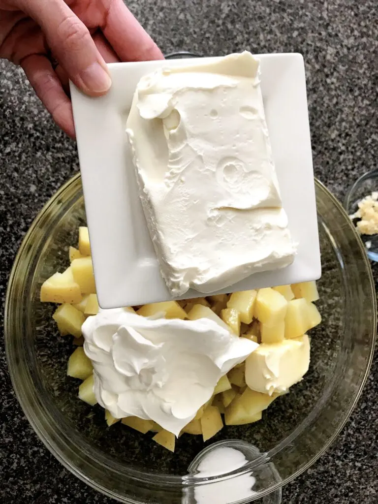 Cream cheese and a bowl of mashed potatoes.