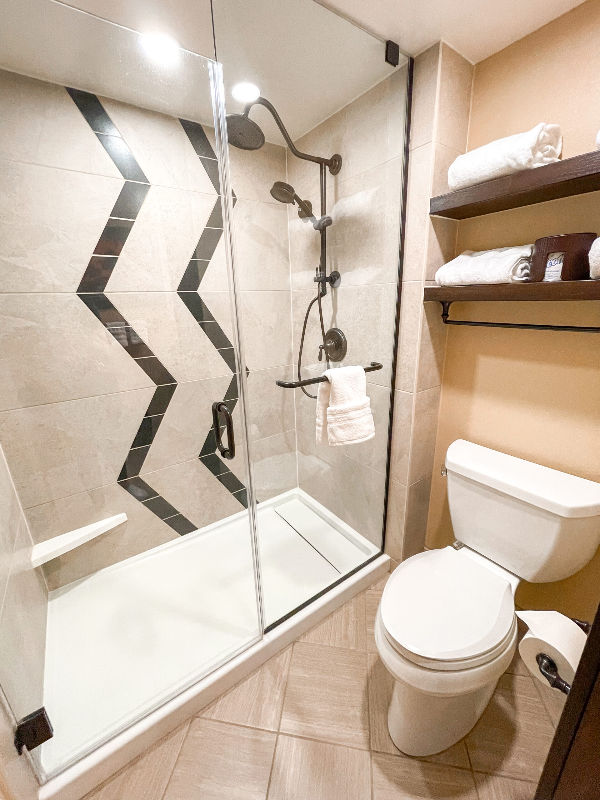 Shower and toilet in a standard room at Disney's Animal Kingdom Lodge.