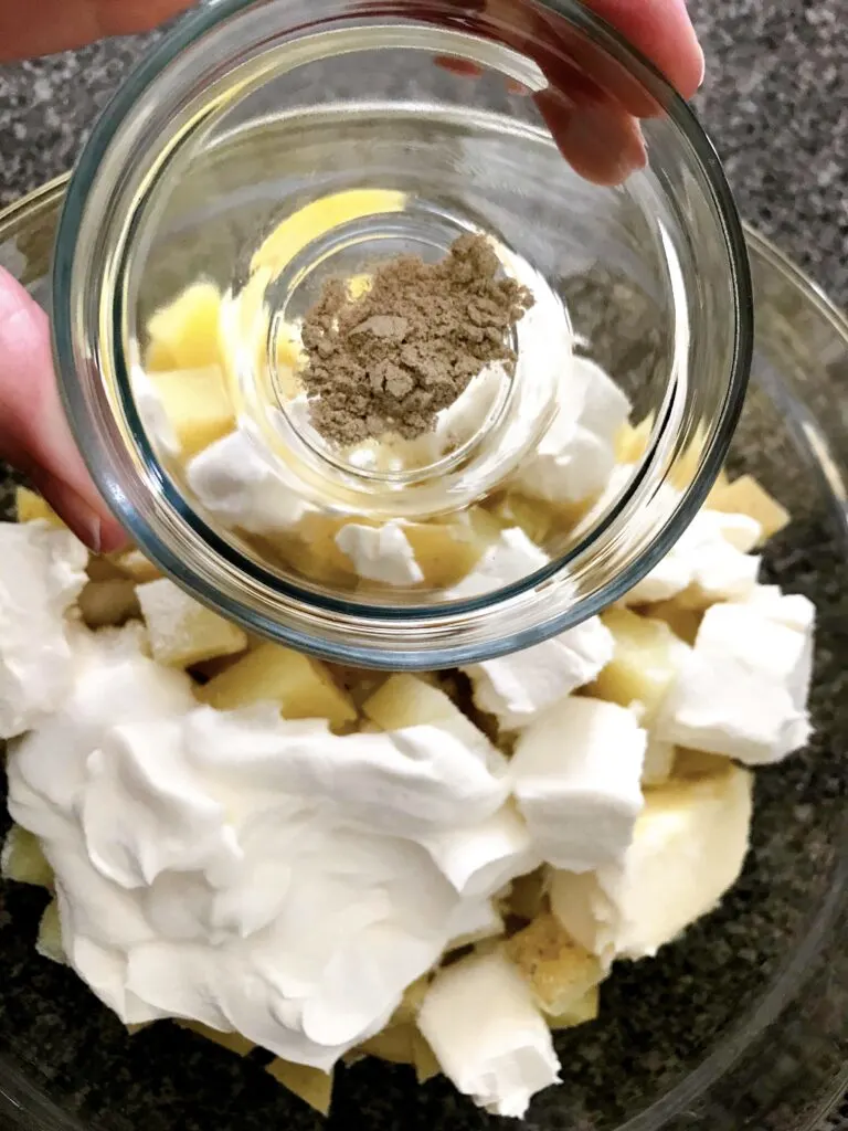 A bowl of white pepper to add to make ahead mashed potatoes.