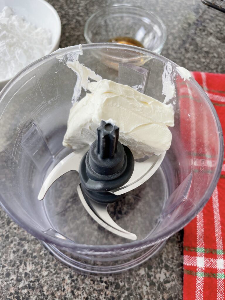 Softened cream cheese in a food processor.