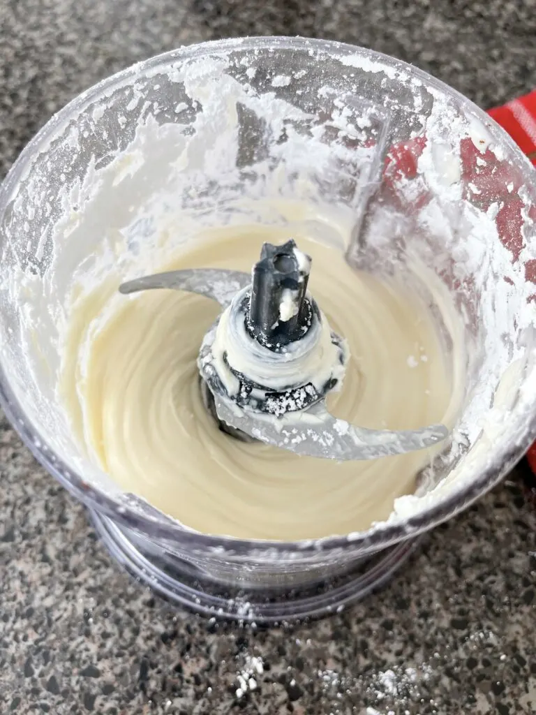Cream cheese frosting in a food processor.
