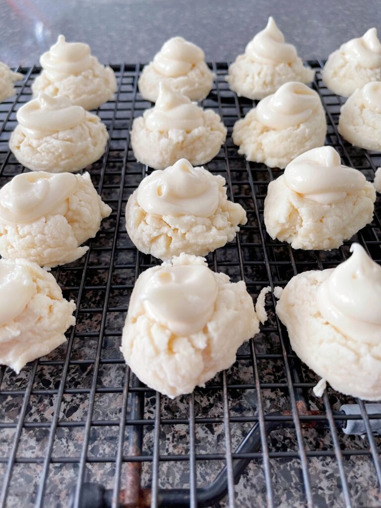Melt Away Christmas cookies with cream cheese frosting.