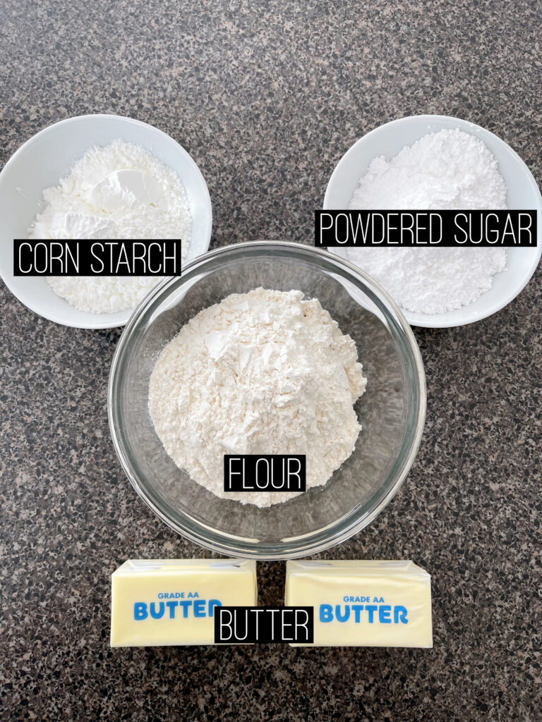 Ingredients labeled in bowls to make melt away cookies.