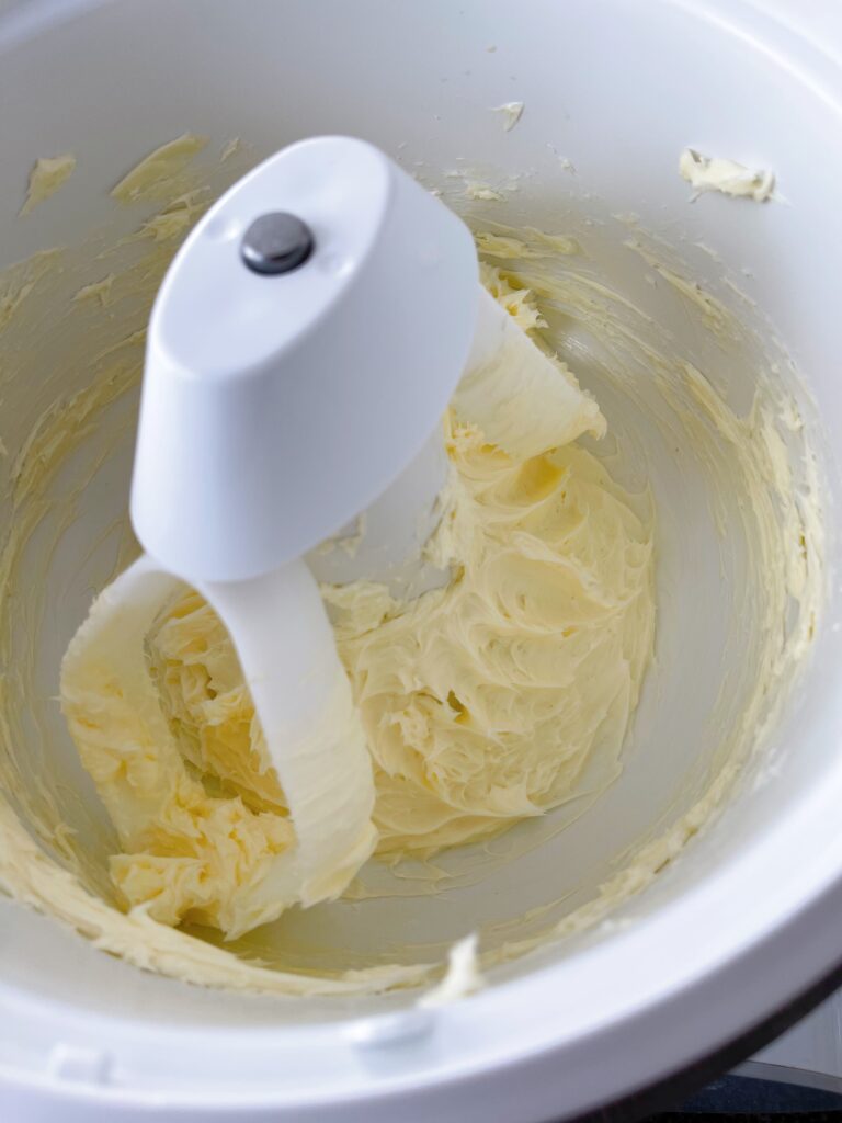 Butter in a mixing bowl.