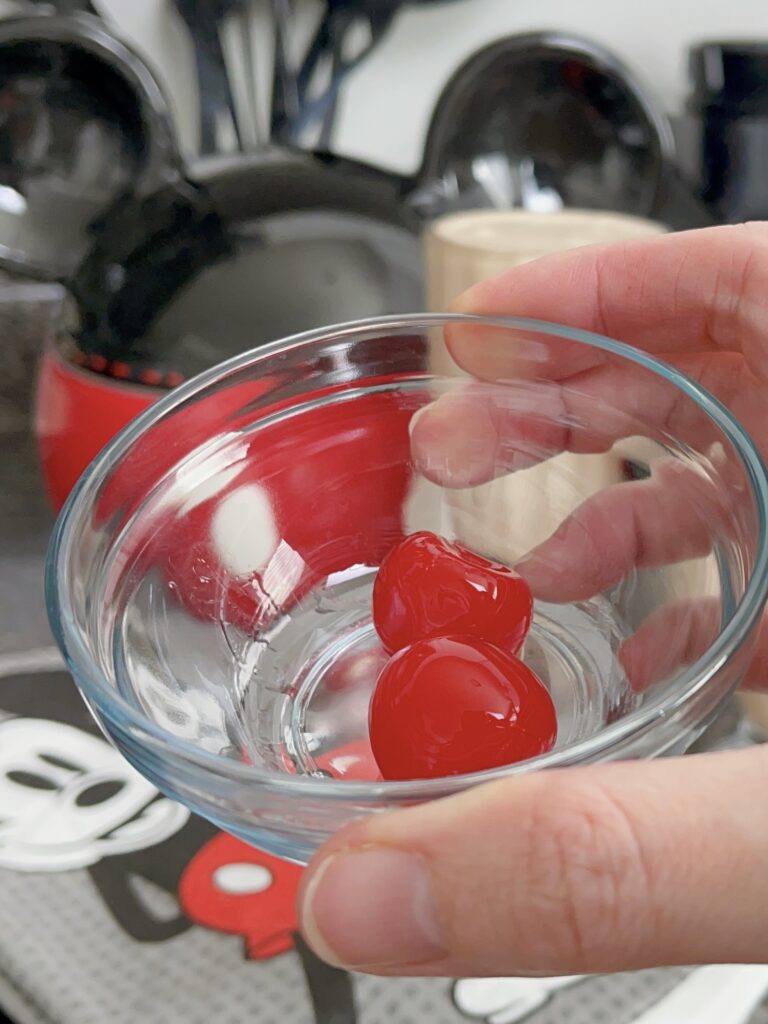 A bowl of Maraschino cherries.