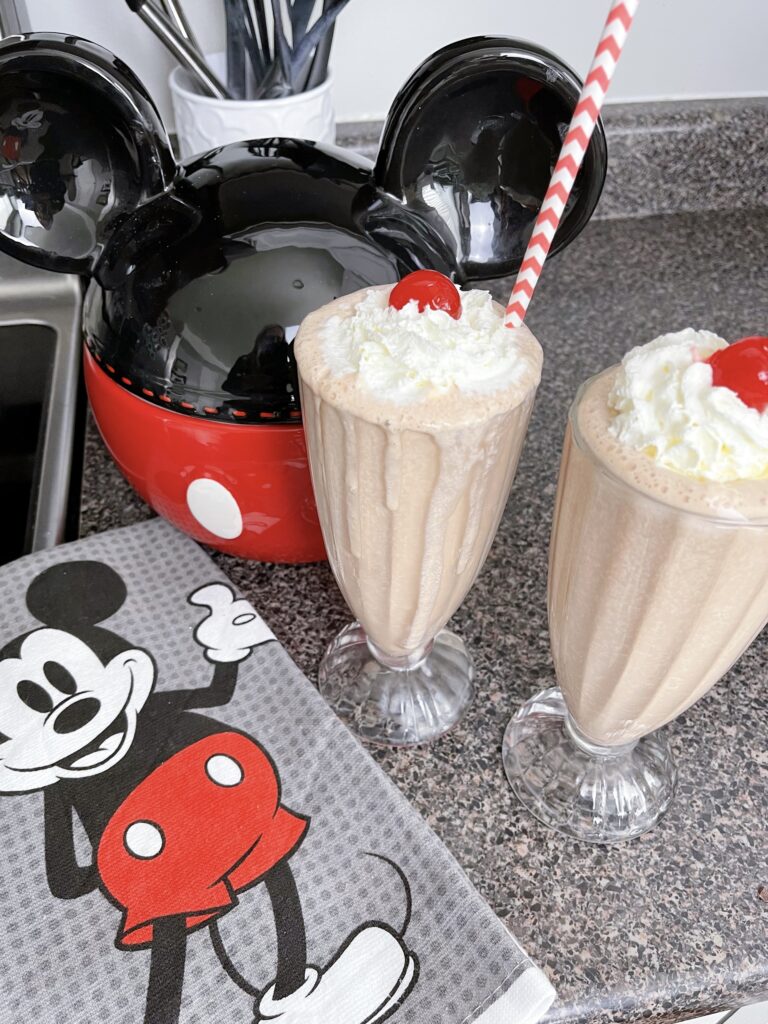Two chocolate malts and a Mickey Mouse towel.