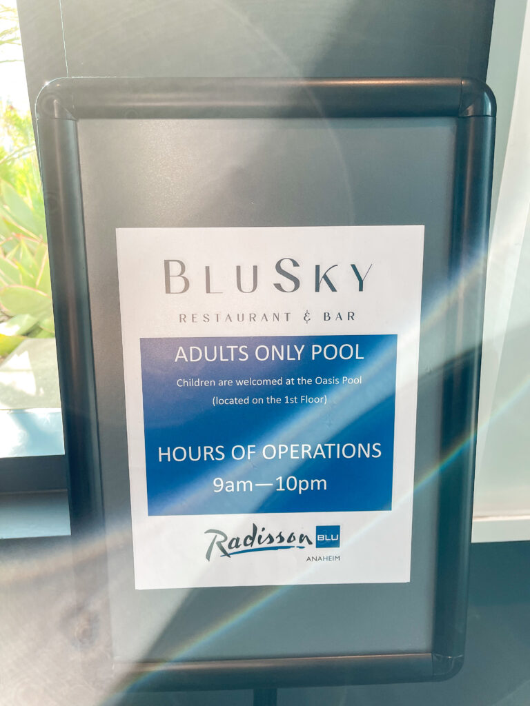 Sign for the rooftop pool at Radisson Blu Anaheim.