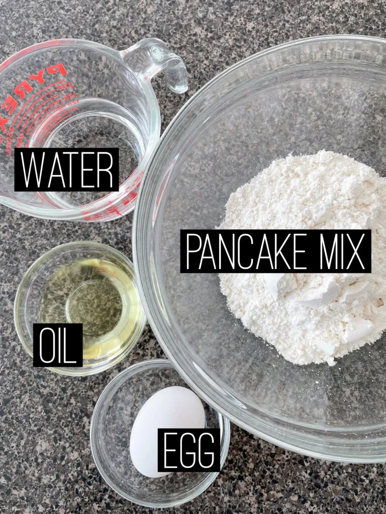 Ingredients to make waffles with pancake mix.