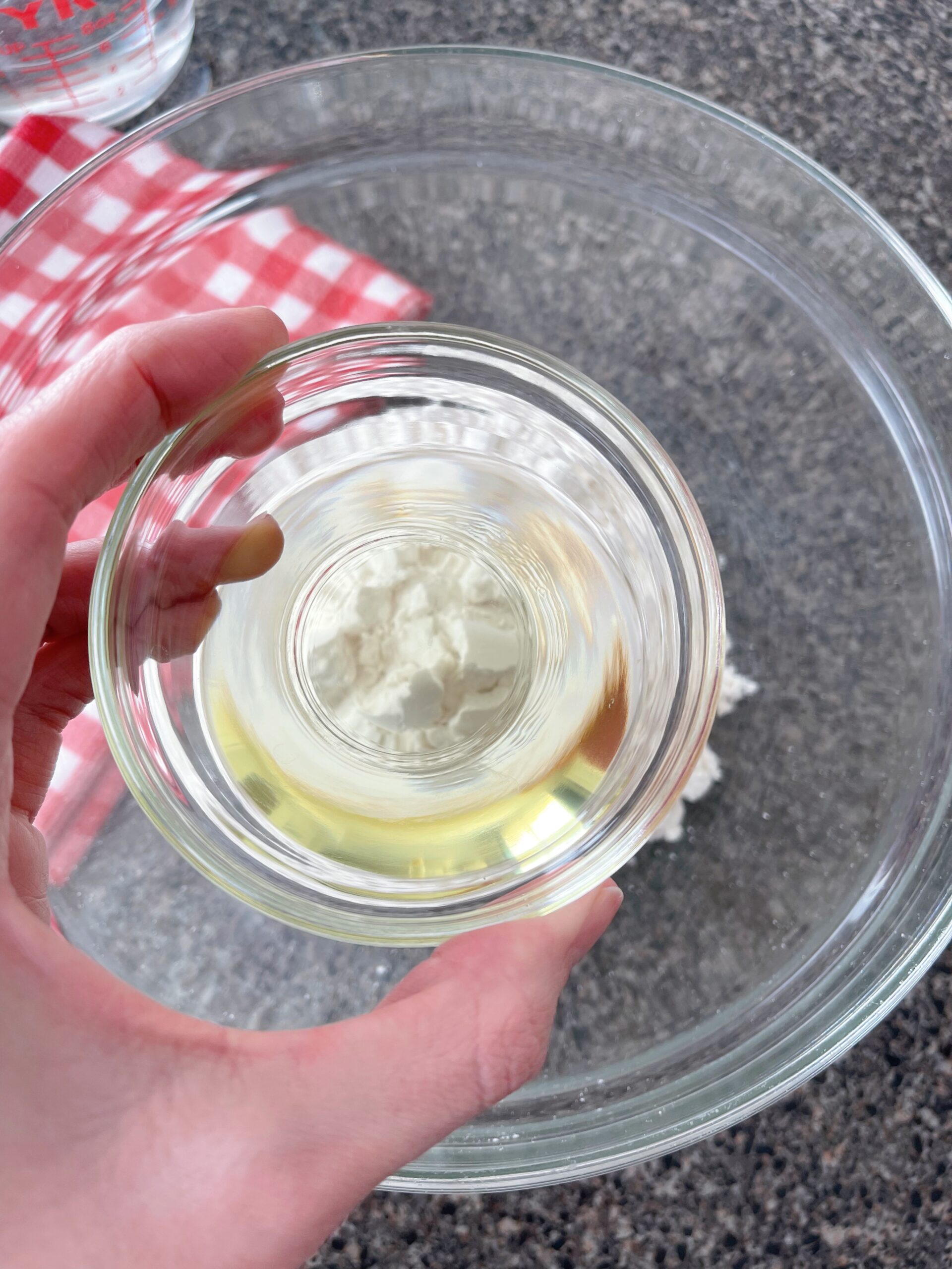 A bowl of vegetable oil to make waffles out of pancake mix.