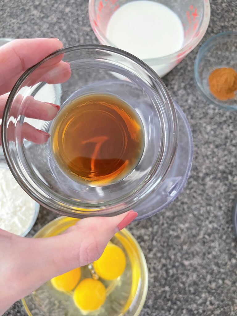 A bowl of vanilla extract.