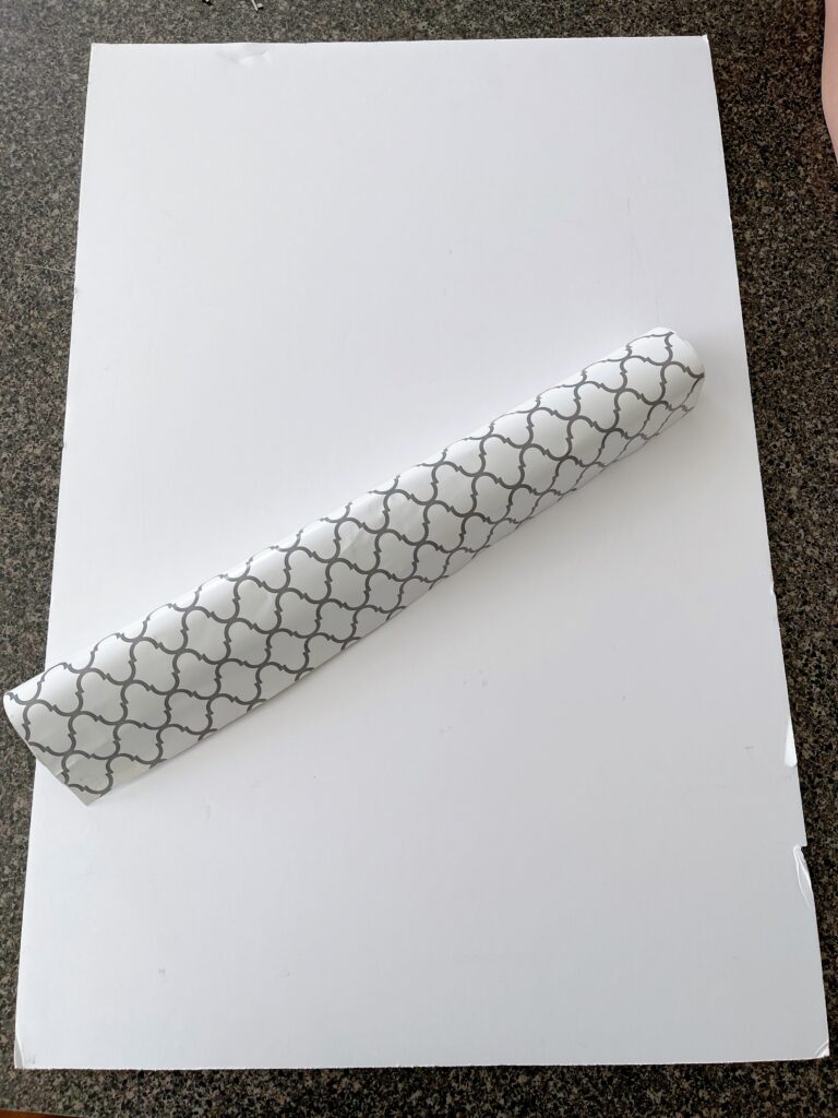 Contact paper and a foam board.