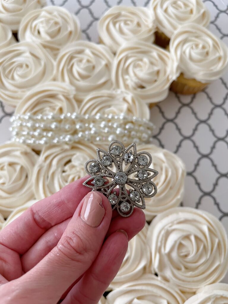 A button to place on a cupcake wedding dress.